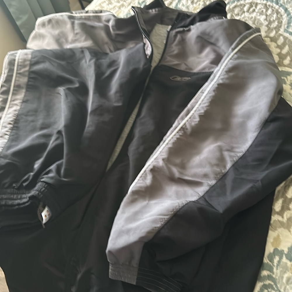 Reebok warm up suit.